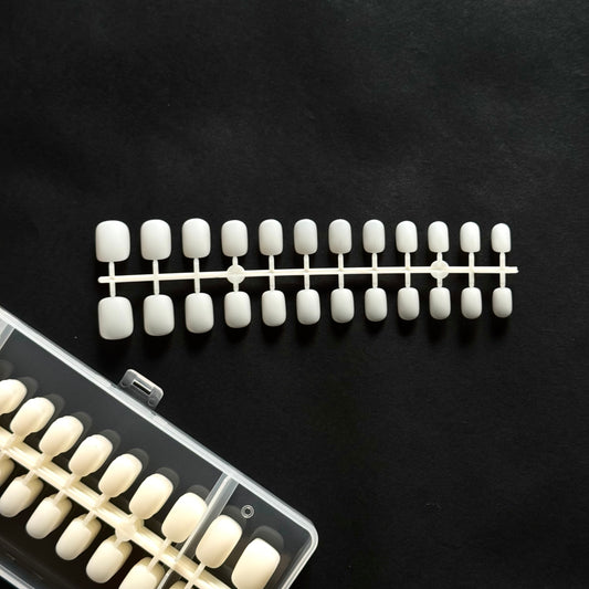 Short squoval tips (natural and fully buffed within)